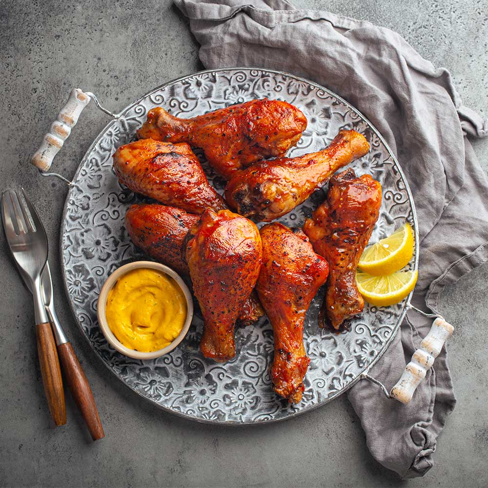 indian-food-tandoori-chicken-legs-from-above-4GNQM9G